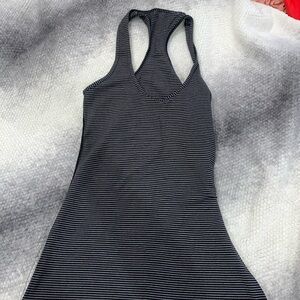 Lululemon workout too, racer back tank size 4 color is charcoal grey and stripes